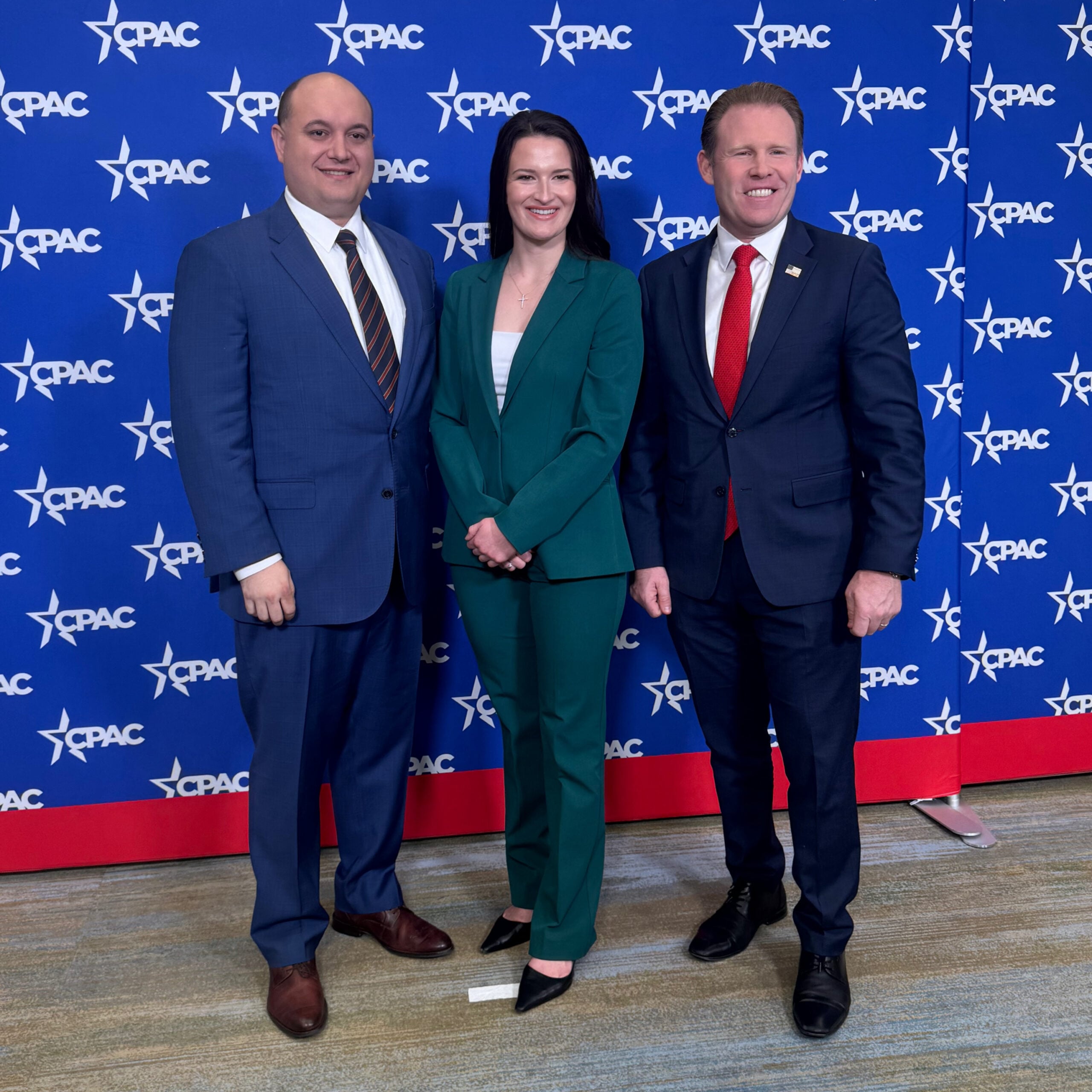 Taylor Talley and Frank Russo with CPAC members supporting the Freedom Fighters program
